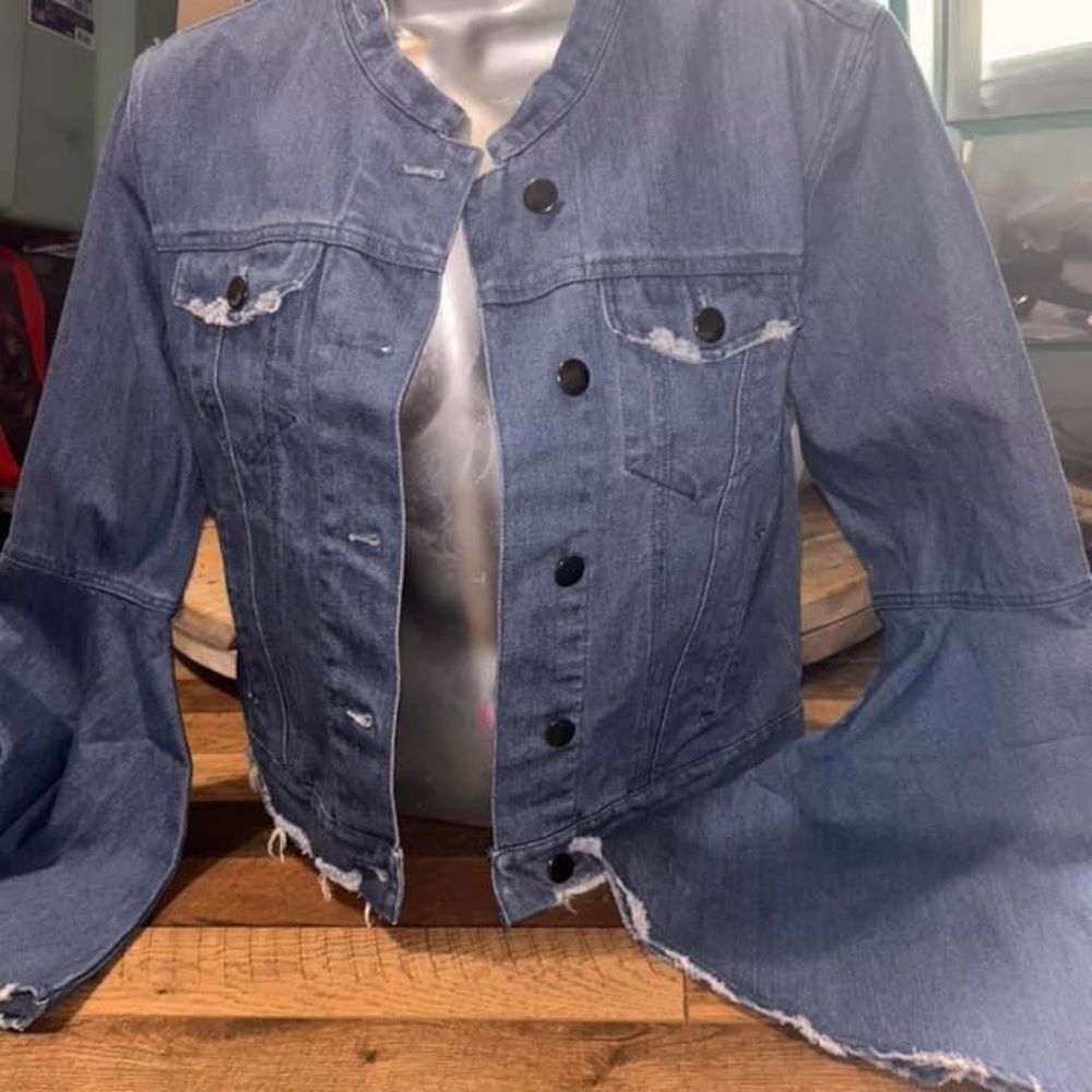 Distressed denim jacket